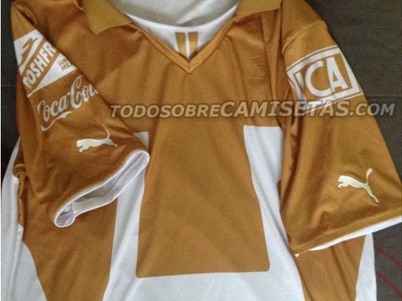 playera pumas dorada