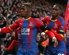 Hodgson says Palace anxious to keep Zaha and Wan-Bissaka